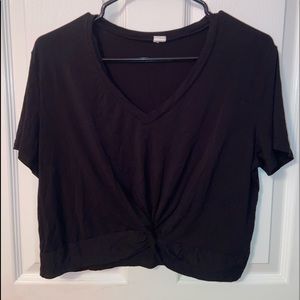 woman’s black cropped v-neck t-shirt